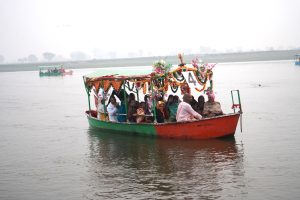 Travelling by boat in Yamuna River